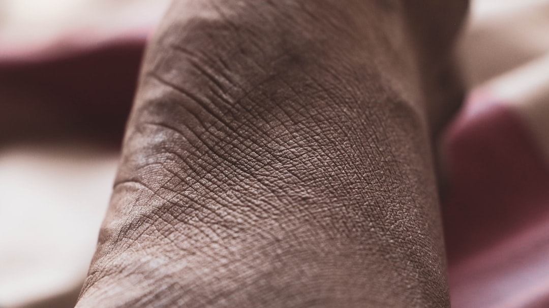 Examining skin for signs of inflammation or disease.