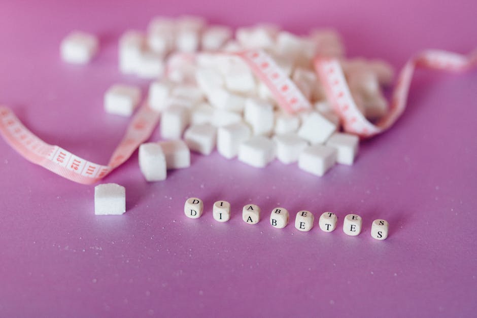 still life of sugar cubes and diabetes concept with a tape m
